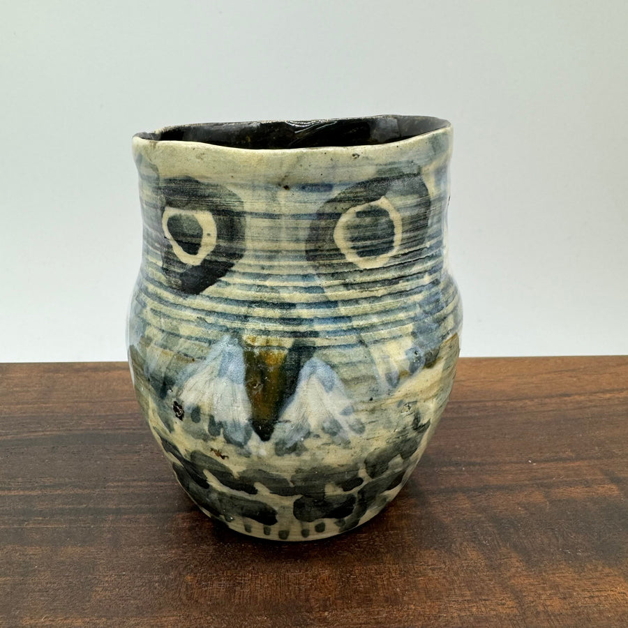 ceramic owl ledger