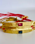 talya mor gold bar bracelet wtih ruby
