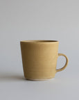 Feel mustard mug